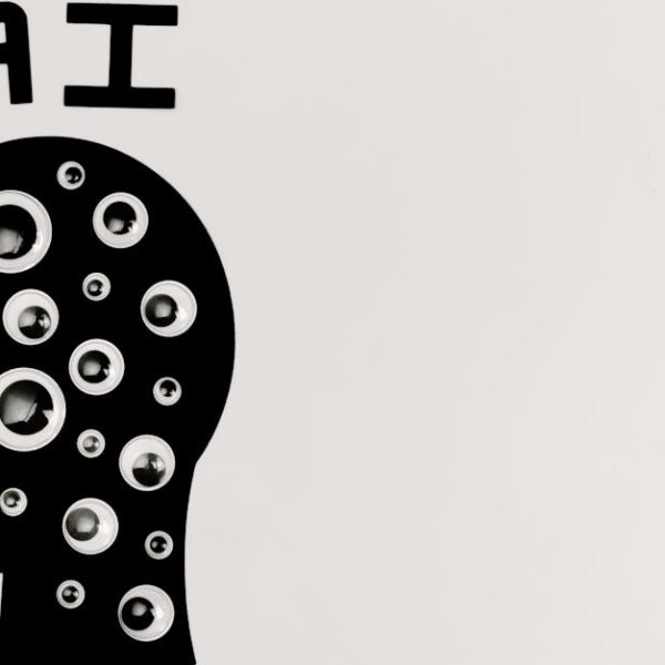 Abstract illustration of AI with silhouette head full of eyes, symbolizing observation and technology.